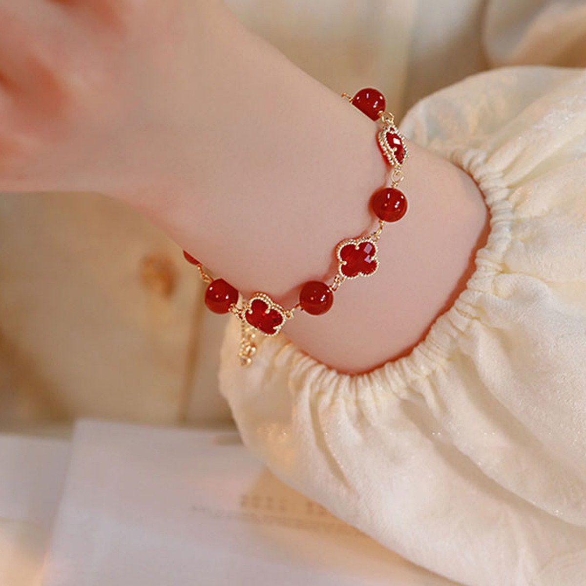 Red Clover Bead Bracelet wrist styling thumbnail