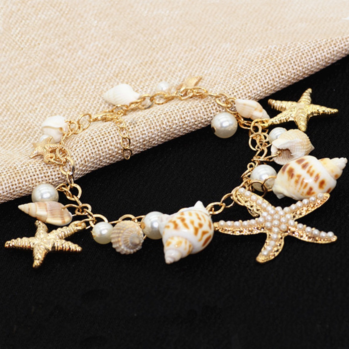 Coastal Shell Charm Bracelet flat lay detail thumbnail