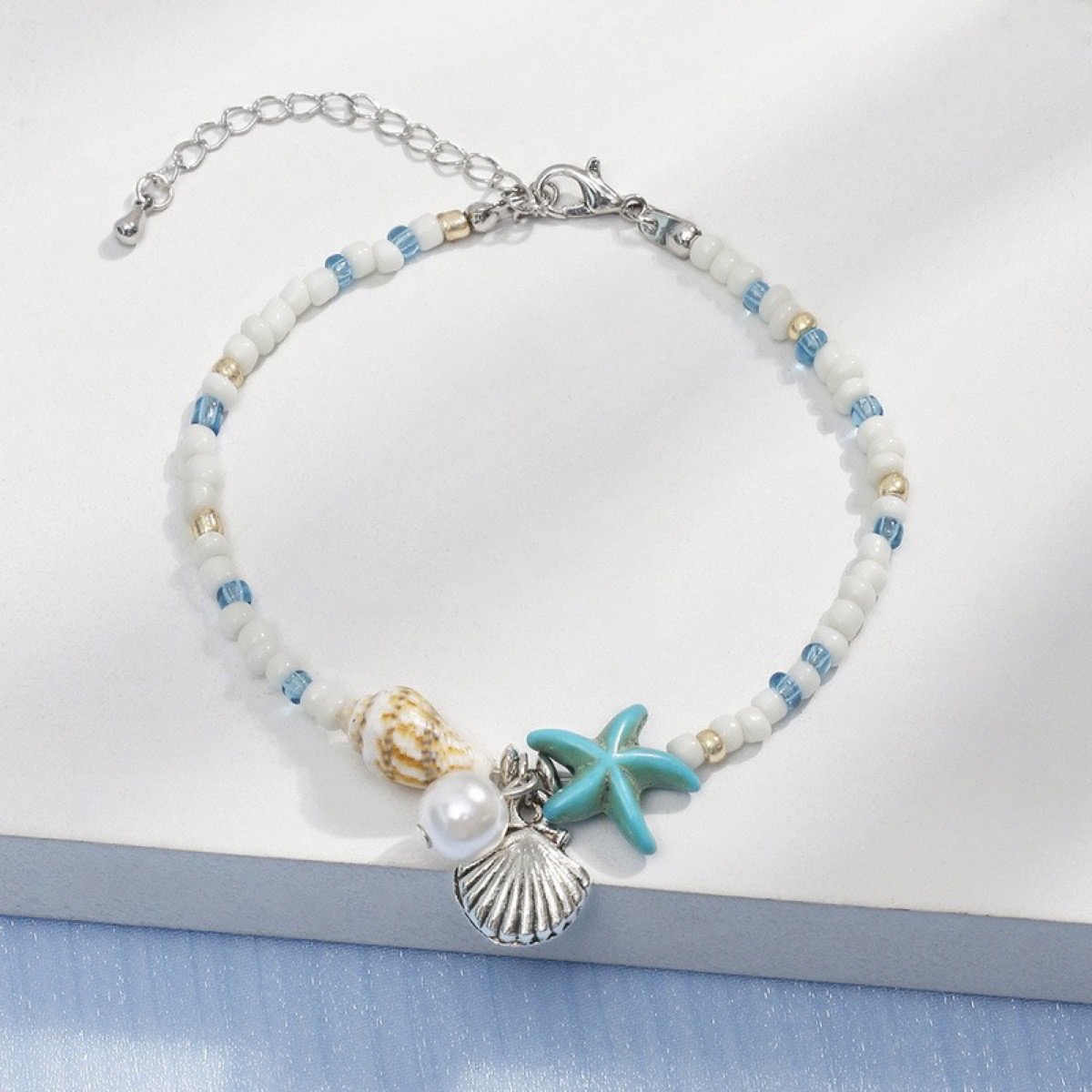 Seaside Shell Starfish Bracelet flat lay detail thumbnail