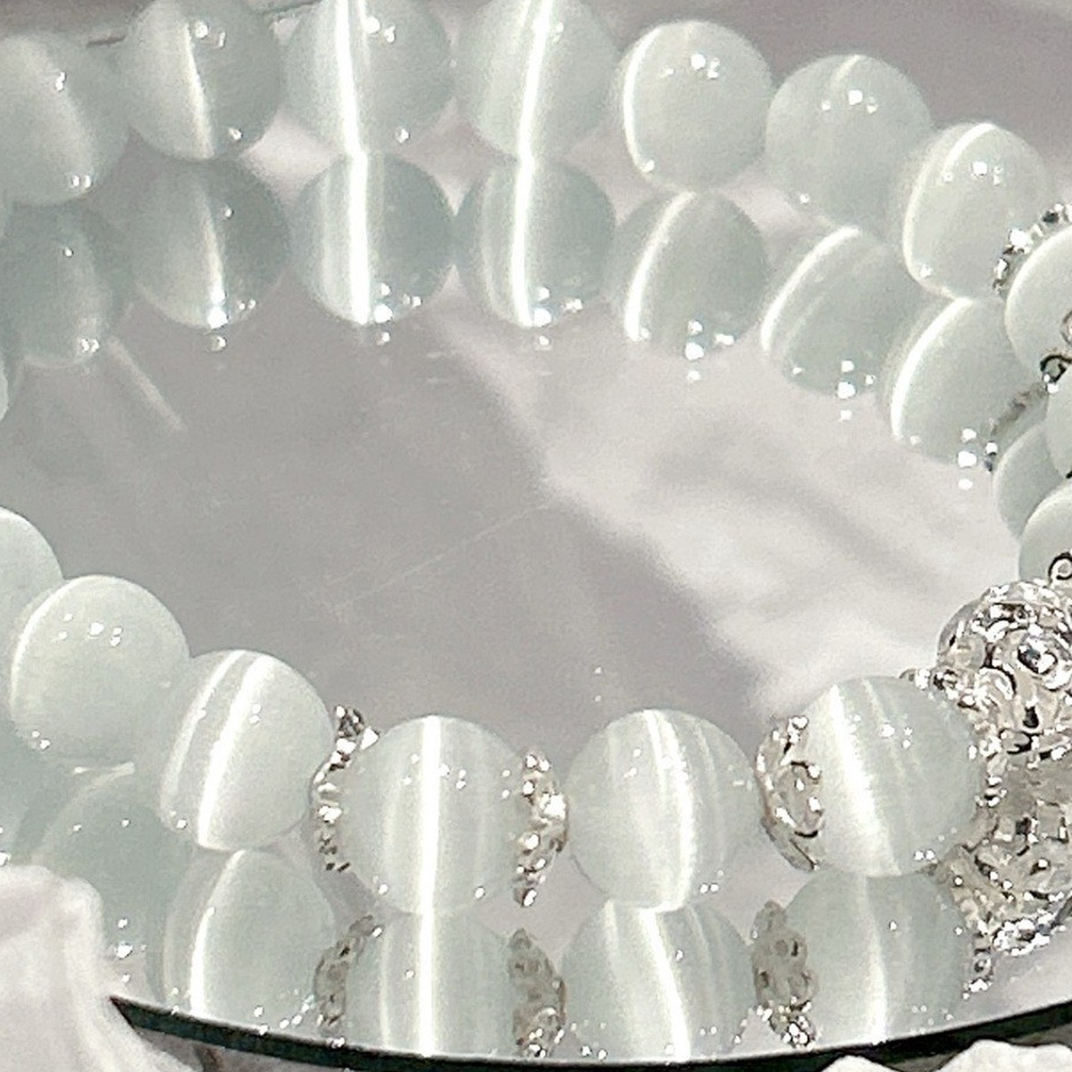 Ice Blue Cat Eye Bead Bracelet wrist styling thumbnail