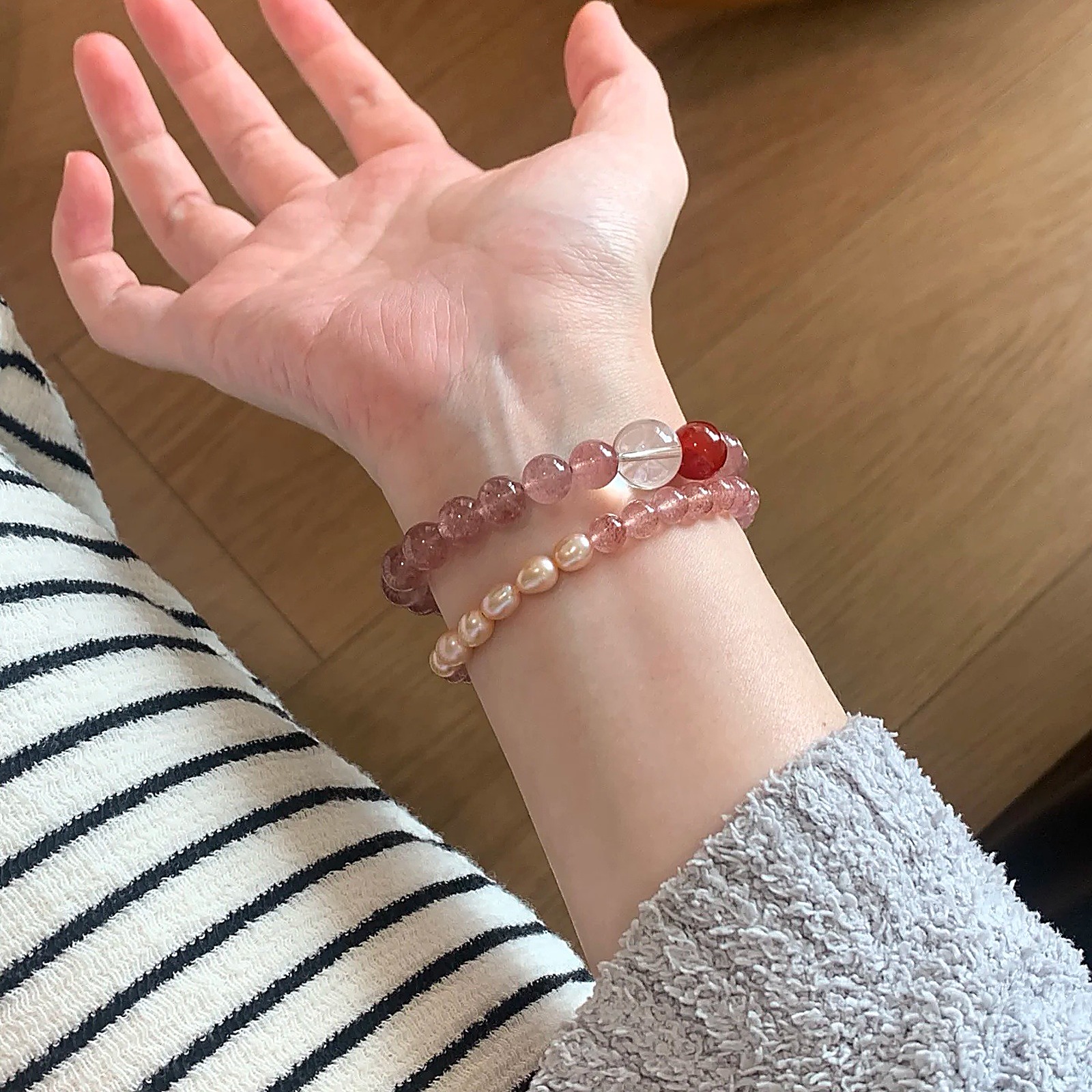 Soft Pink Strawberry Quartz Bracelet flat lay detail thumbnail