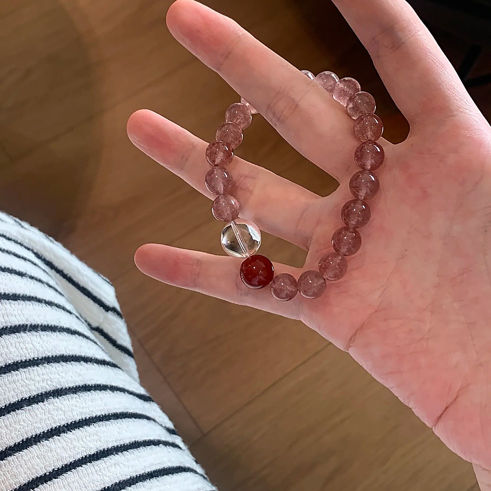 Soft Pink Strawberry Quartz Bracelet wrist styling thumbnail