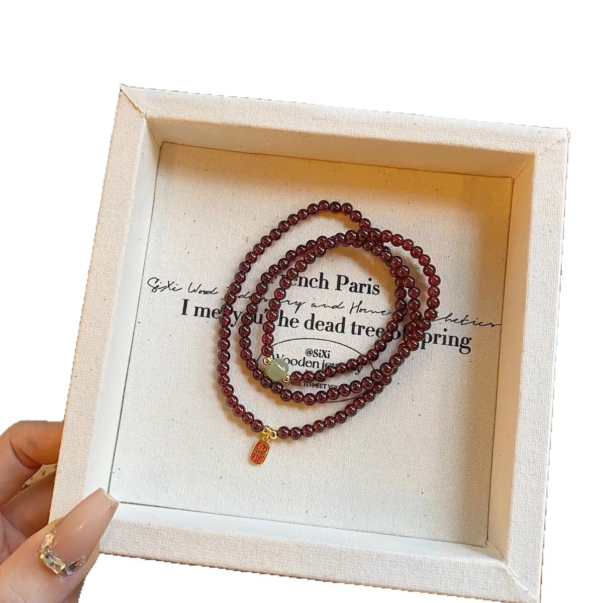 Wine Garnet Wrap Bracelet flat lay detail thumbnail