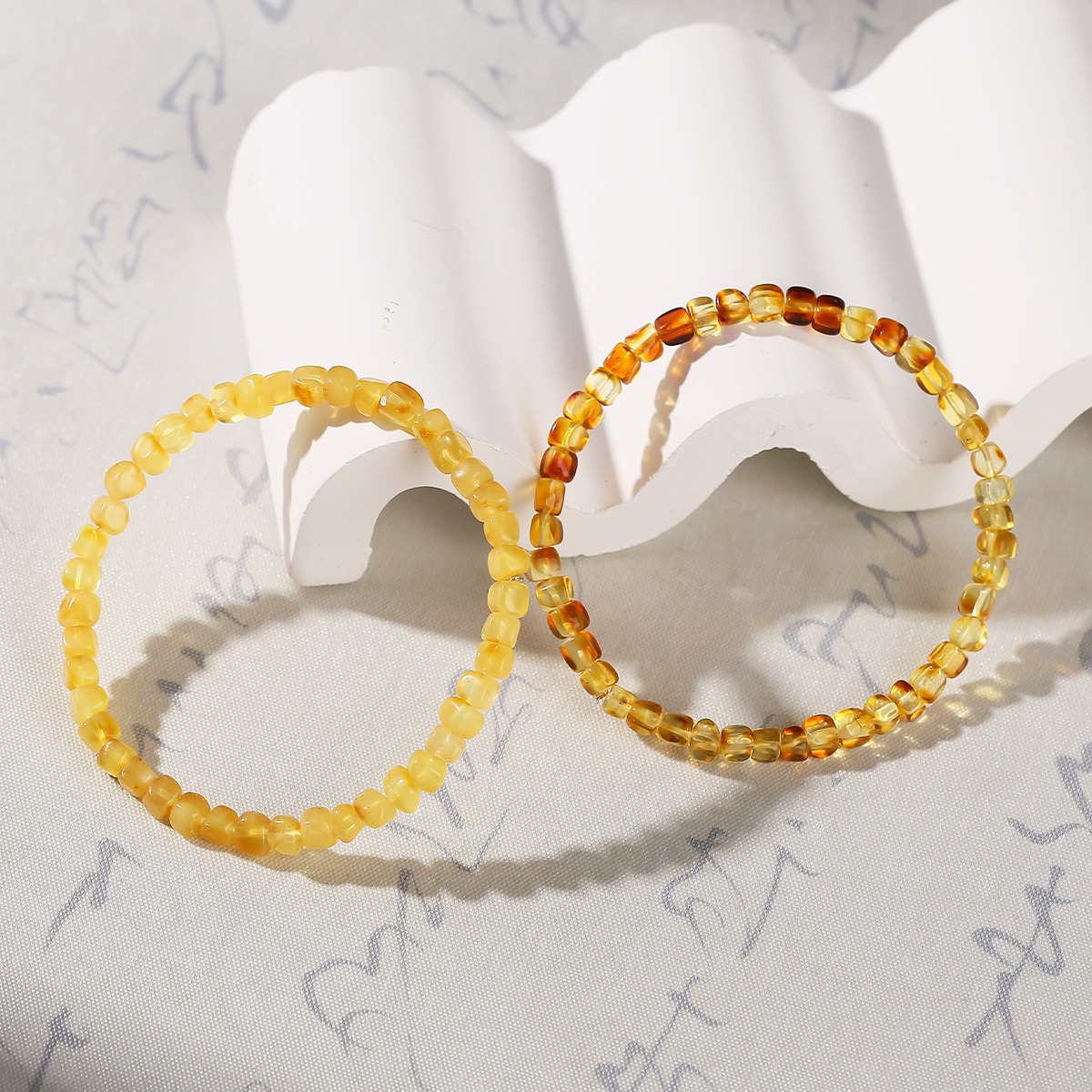 Golden Amber Bead Bracelet flat lay detail thumbnail