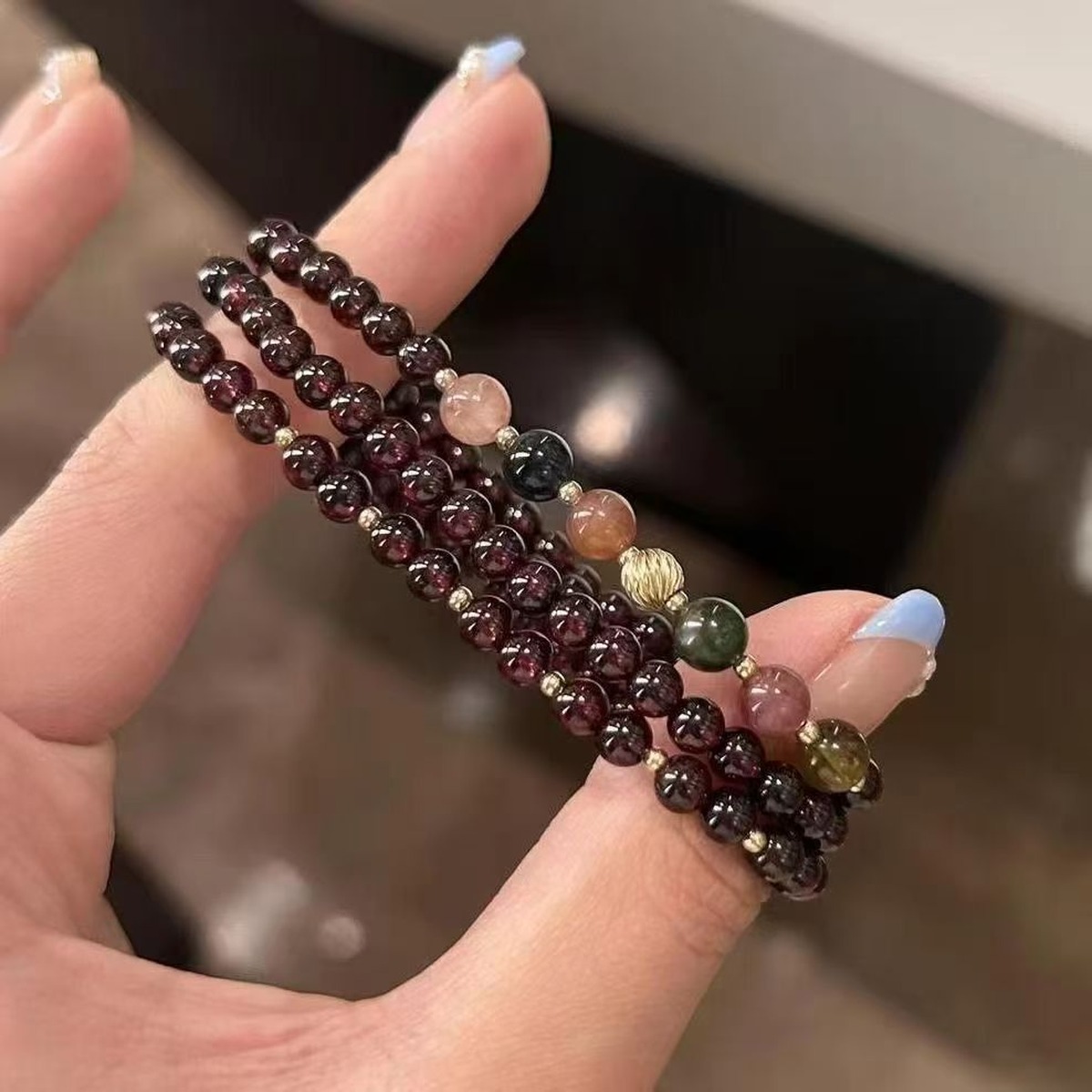 Wine Garnet Layer Bracelet flat lay detail thumbnail